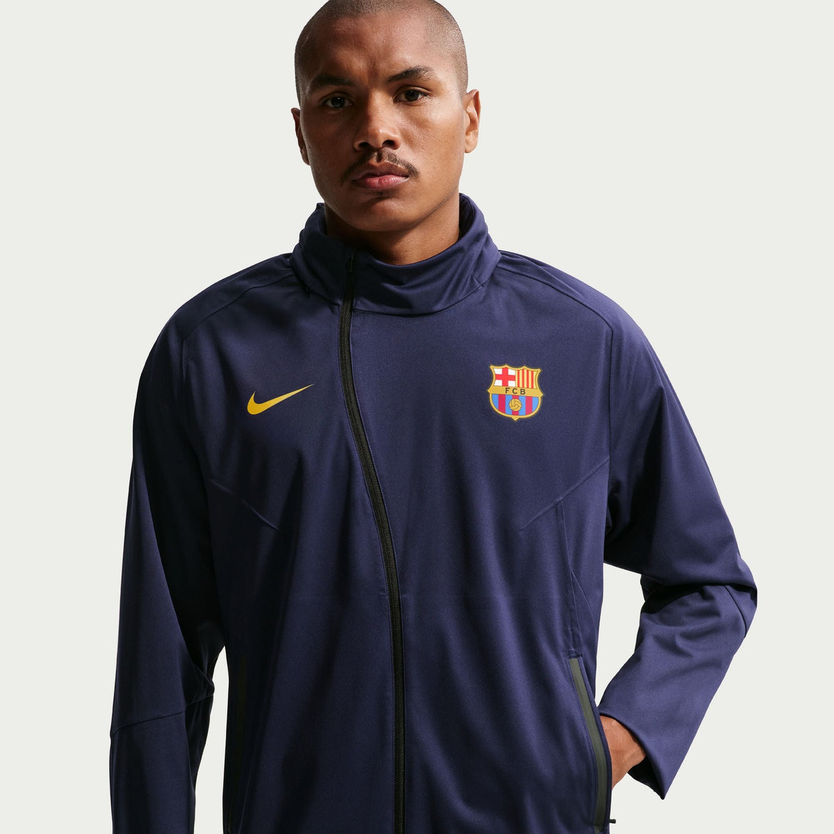Nike FC Barcelona Strike Shield Men Nike Soccer Hooded Rain Jacket product image 1, provided for visual reference and